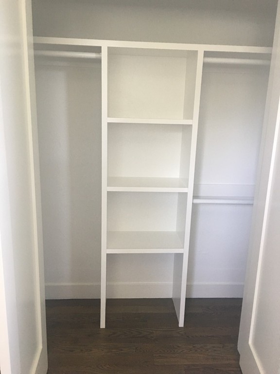 45 Clement Avenue, Unit 3 Boston, MA 02132 - Photo 22 of 35 a view of an empty walk in closet