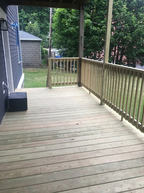 45 Clement Avenue, Unit 3 Boston, MA 02132 - Photo 32 of 35 a view of outdoor space and deck