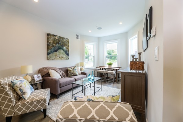 45 Clement Avenue, Unit 3 Boston, MA 02132 - Photo 6 of 35 a living room with furniture a couch and a window