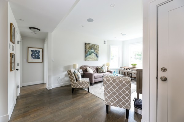 45 Clement Avenue, Unit 3 Boston, MA 02132 - Photo 7 of 35 a living room with furniture and a window