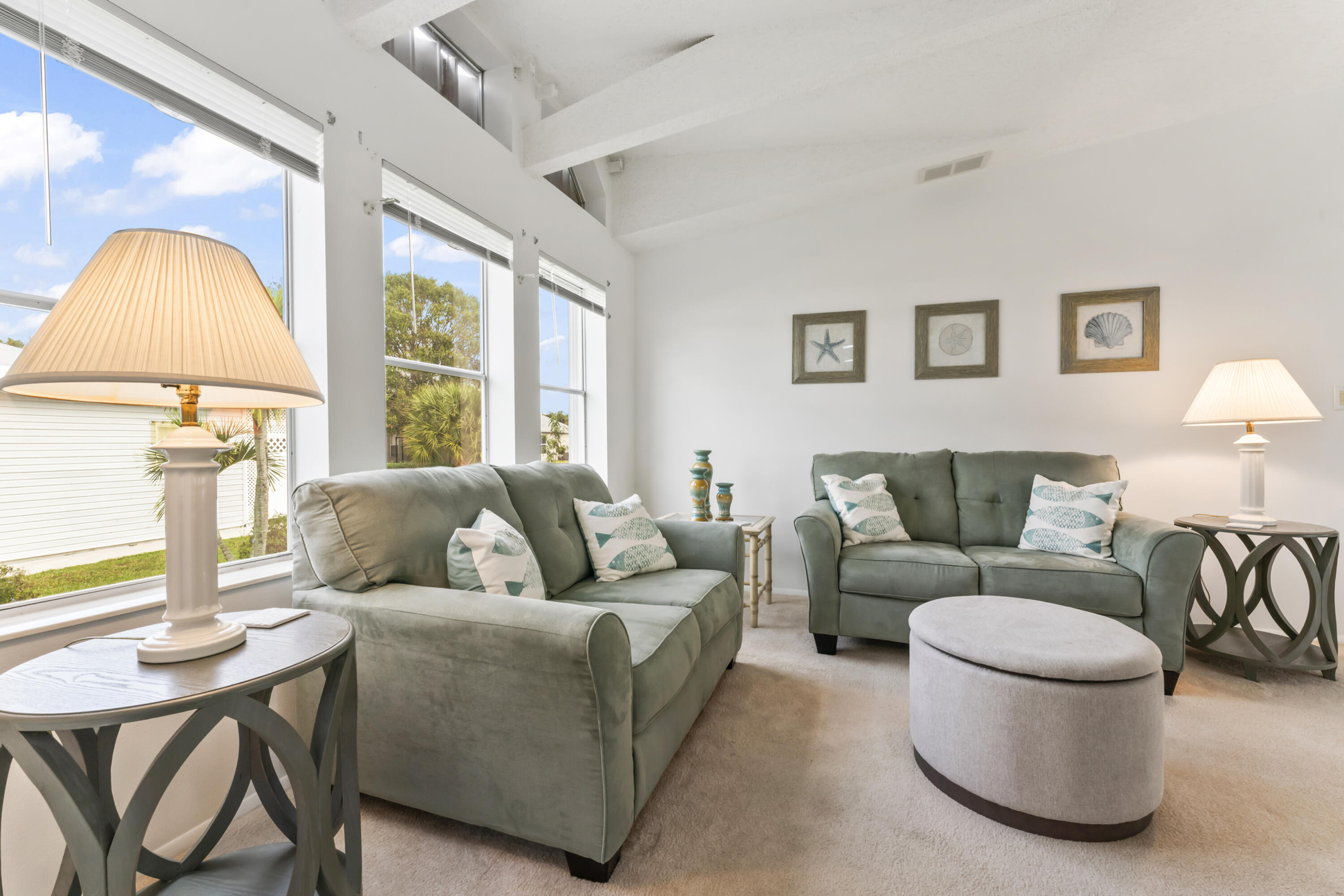 8913 Southwest Chevy Circle Stuart, FL 34997 - Photo 5 of 22 a living room with furniture and a window