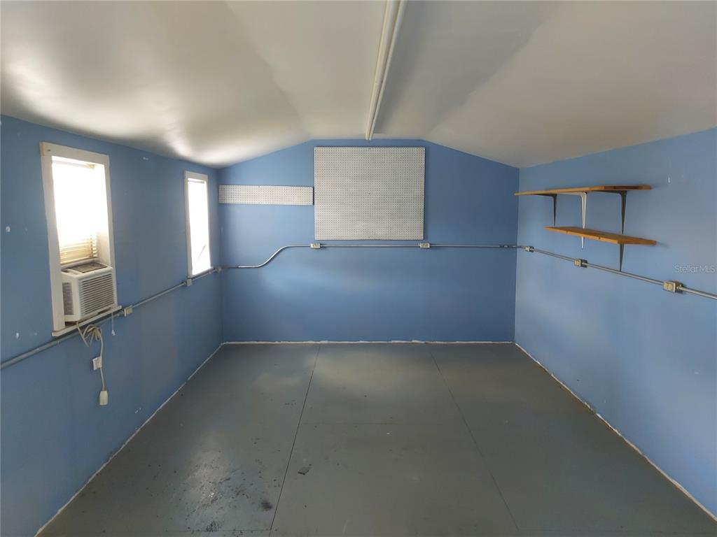 9706 Southwest 30th Terrace Ocala, FL 34476 - Photo 14 of 16 a view of an empty room with a window