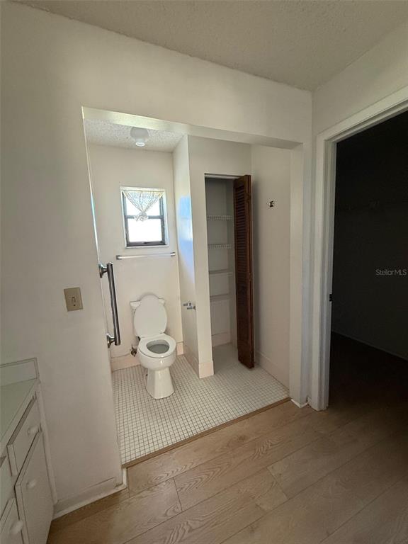 9706 Southwest 30th Terrace Ocala, FL 34476 - Photo 6 of 16 a bathroom with a toilet