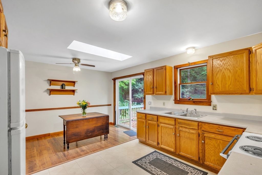 30 Montague Road Sunderland, MA 01375 - Photo 15 of 39 a kitchen with sink a window and cabinets