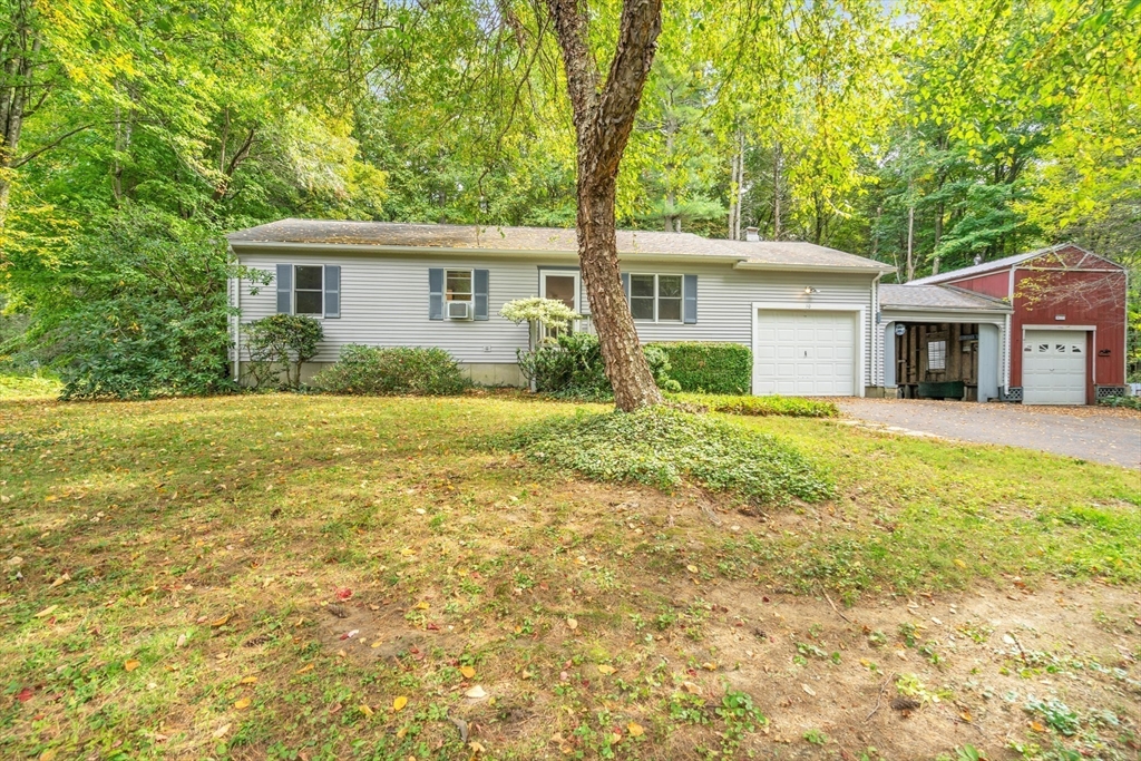 30 Montague Road Sunderland, MA 01375 - Photo 2 of 39 a view of a house with a yard and potted plants