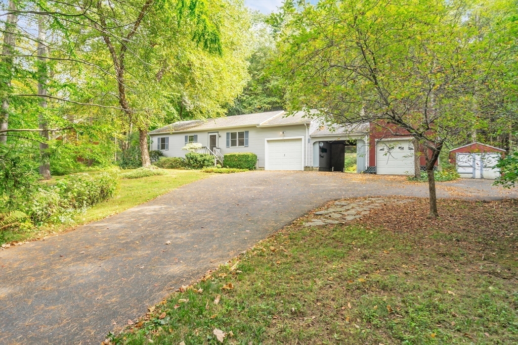 30 Montague Road Sunderland, MA 01375 - Photo 31 of 39 front view of a house with a yard