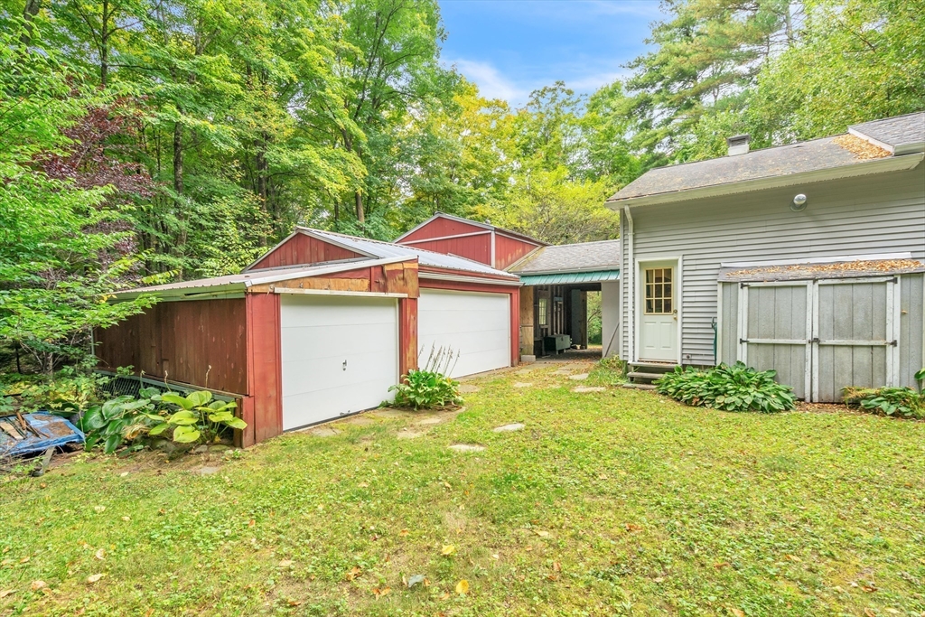 30 Montague Road Sunderland, MA 01375 - Photo 4 of 39 front view of a house with a yard