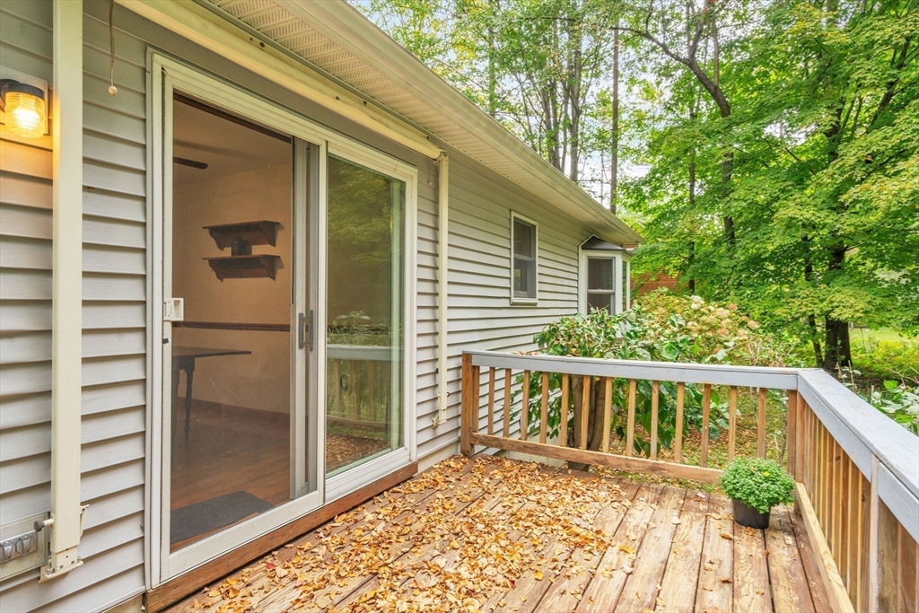 30 Montague Road Sunderland, MA 01375 - Photo 5 of 39 a view of balcony with wooden floor and fence