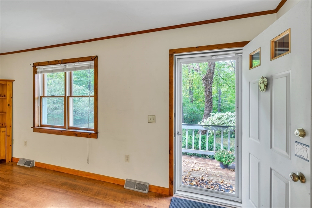 30 Montague Road Sunderland, MA 01375 - Photo 7 of 39 a view of an empty room with wooden floor and a window