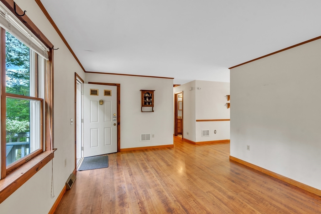 30 Montague Road Sunderland, MA 01375 - Photo 9 of 39 a view of empty room with wooden floor and fan