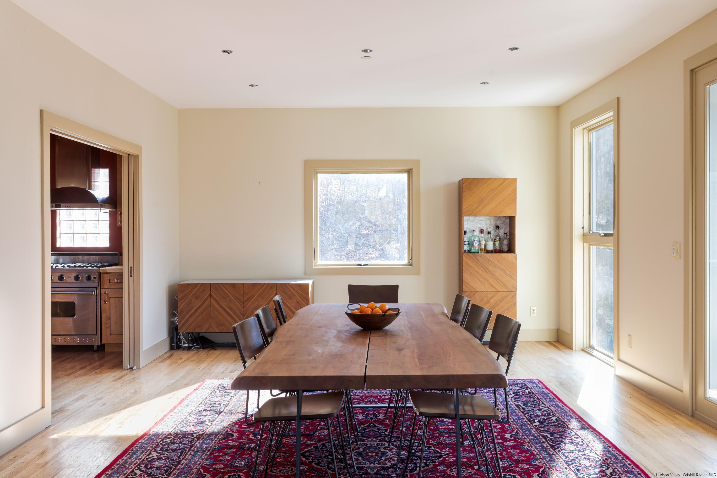 21 Private Way Garrison, NY 10524 - Photo 16 of 35 a view of a dining room with furniture and window