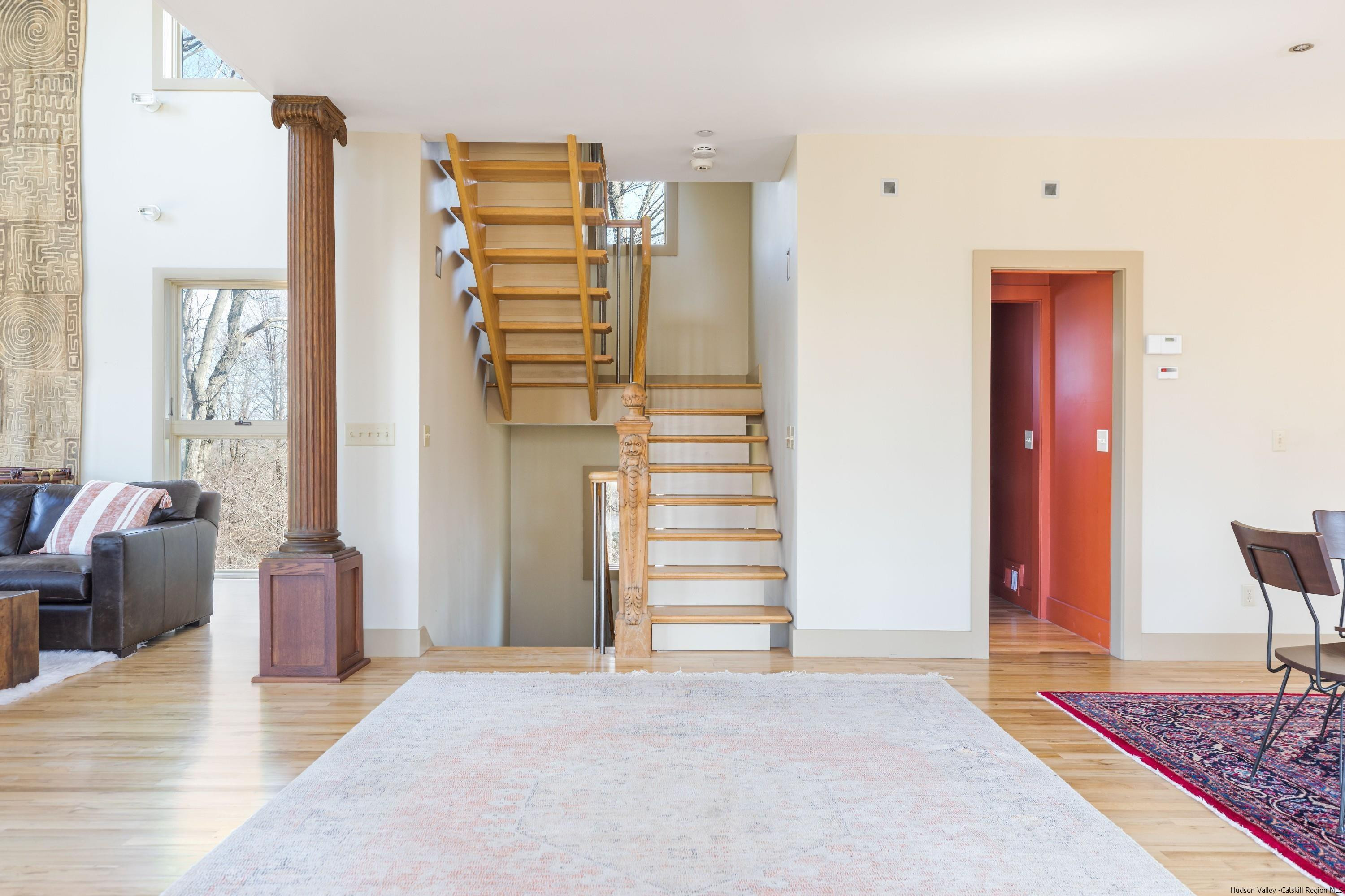 21 Private Way Garrison, NY 10524 - Photo 20 of 35 a view of a bedroom with wooden floor and windows