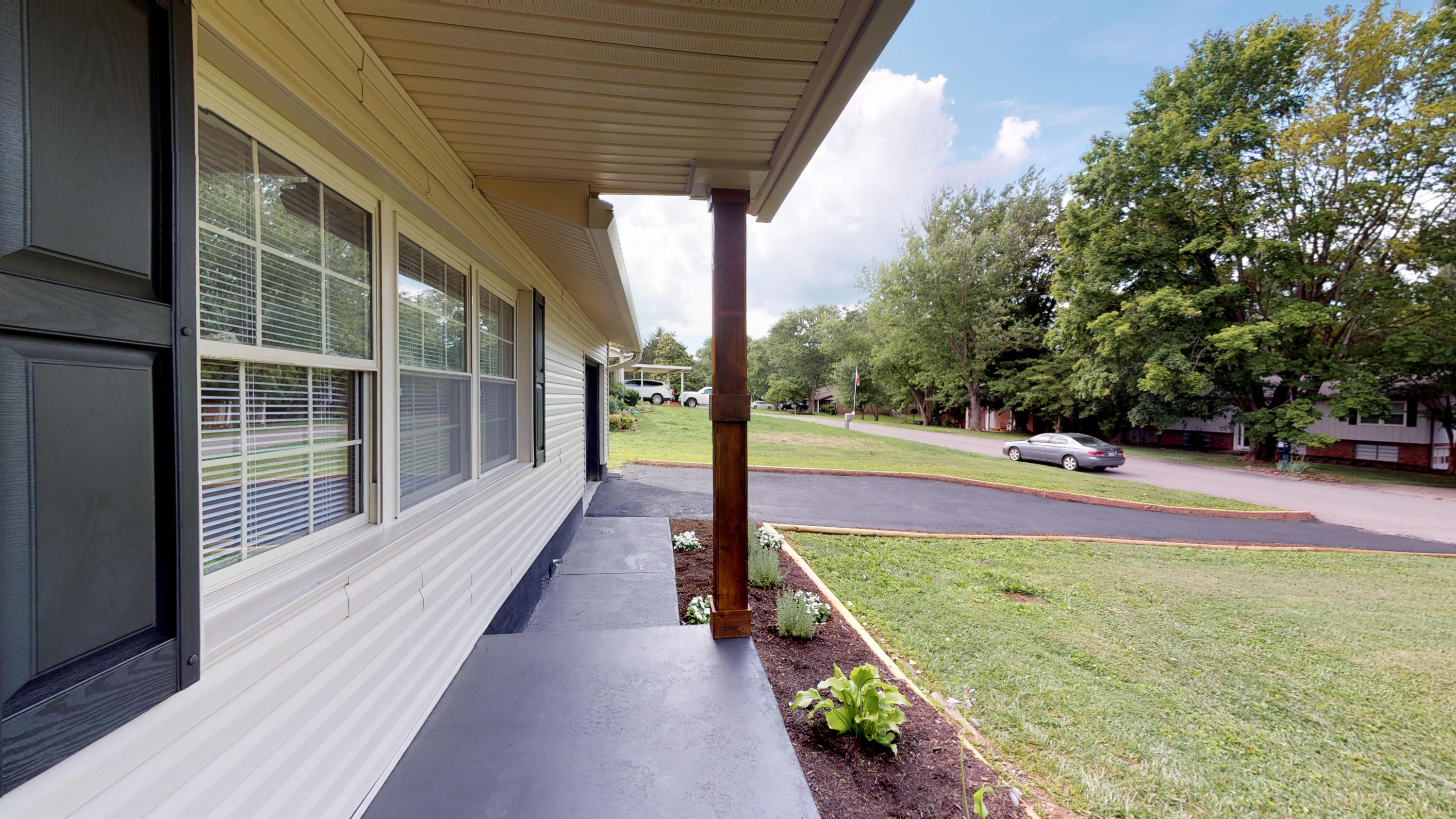 7721 Widdecomb Road Powell, TN 37849 - Photo 2 of 25 7721-Widdecomb-Rd-front-porch-1