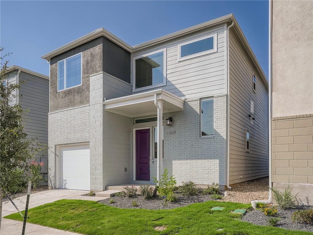 1309 Showbox Street, Unit 6 Pflugerville, TX 78660 - Photo 1 of 24 a front view of house with yard