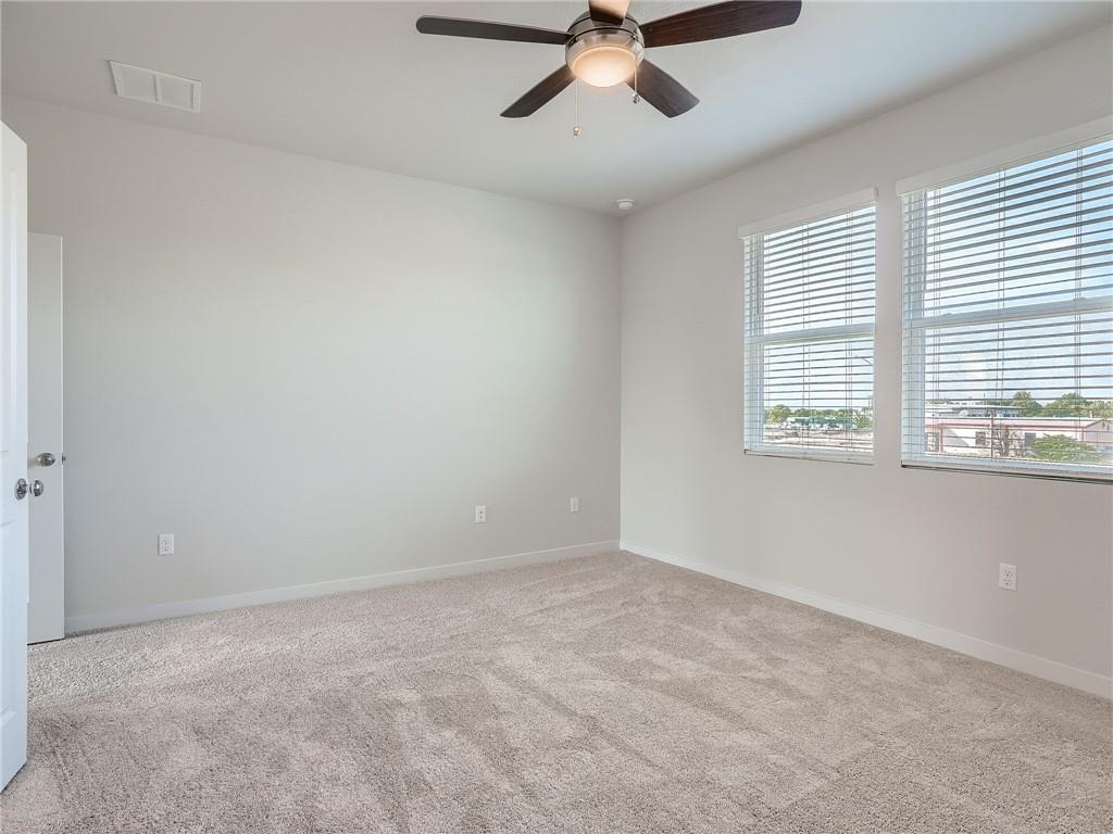 1309 Showbox Street, Unit 6 Pflugerville, TX 78660 - Photo 15 of 24 a view of an empty room with a window