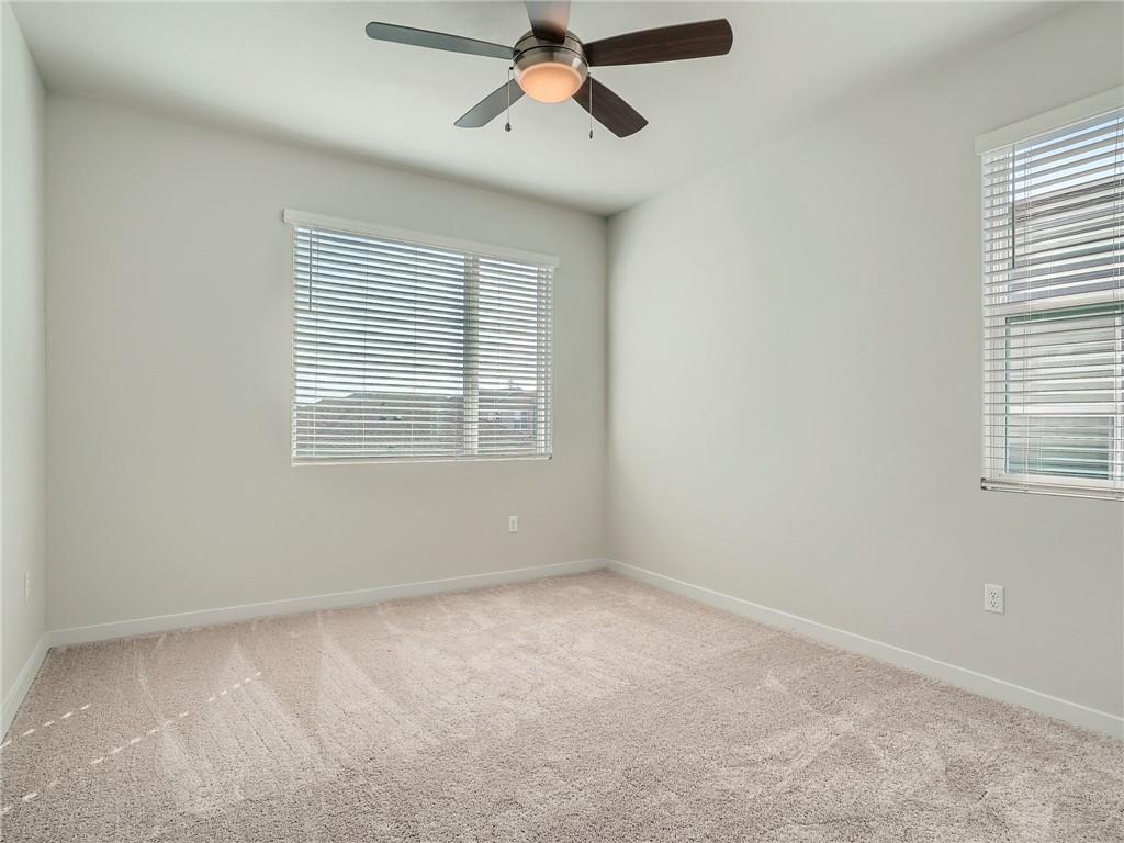 1309 Showbox Street, Unit 6 Pflugerville, TX 78660 - Photo 18 of 24 a view of an empty room with a window