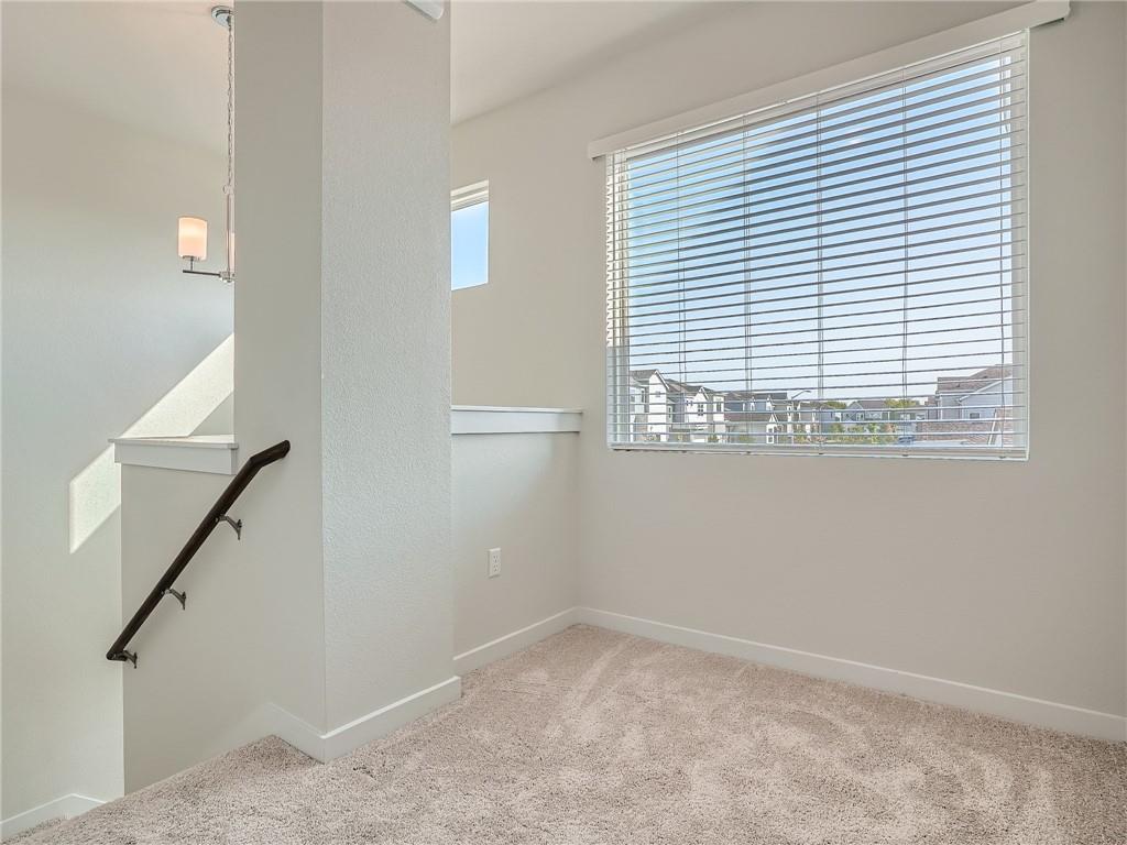 1309 Showbox Street, Unit 6 Pflugerville, TX 78660 - Photo 23 of 24 a view of empty room with windows
