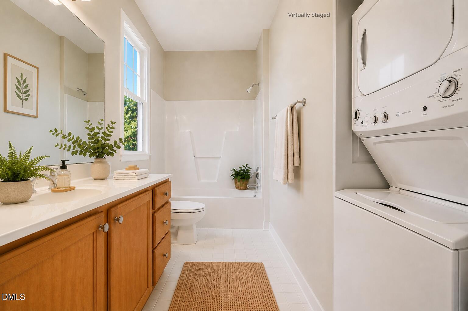801 Moratuck Drive, Unit 202 Raleigh, NC 27604 - Photo 16 of 23 a bathroom with a sink a toilet and shower