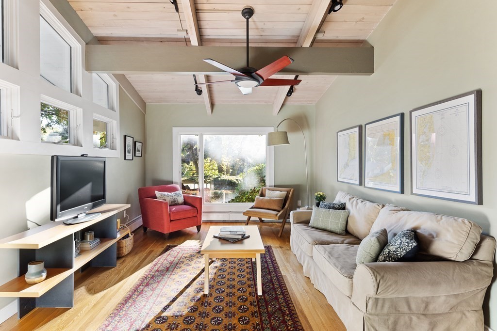 4 Lantern Lane Lexington, MA 02421 - Photo 11 of 29 a living room with furniture or couch and a flat screen tv