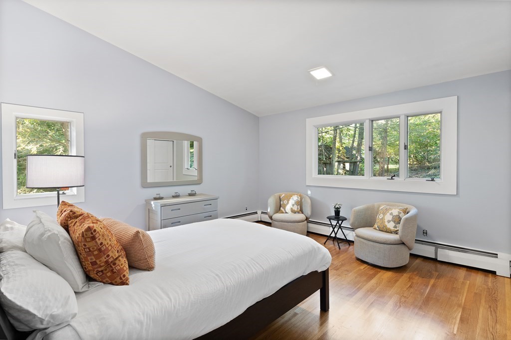 4 Lantern Lane Lexington, MA 02421 - Photo 14 of 29 a bedroom with a bed and a window