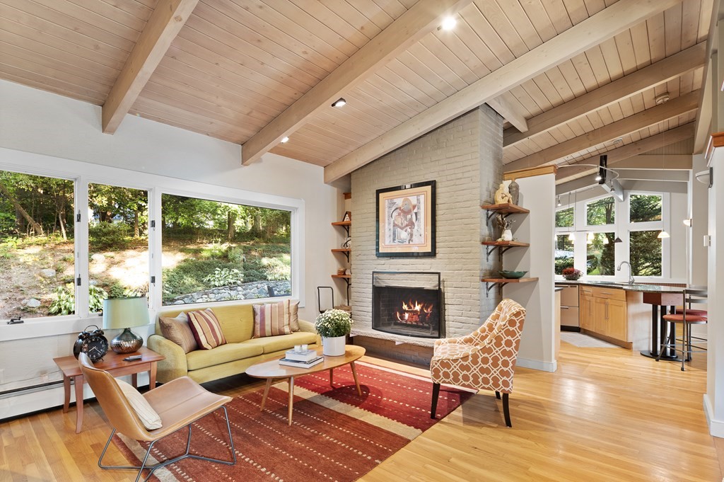 4 Lantern Lane Lexington, MA 02421 - Photo 2 of 29 a living room with furniture and a fireplace