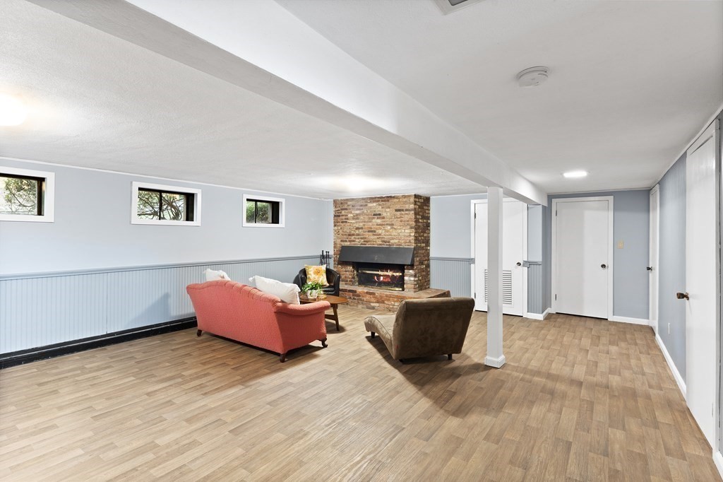 4 Lantern Lane Lexington, MA 02421 - Photo 21 of 29 a living room with furniture window and a wooden floor