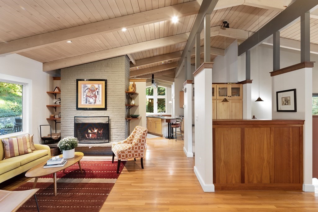 4 Lantern Lane Lexington, MA 02421 - Photo 3 of 29 a living room with furniture wooden floor and a fireplace