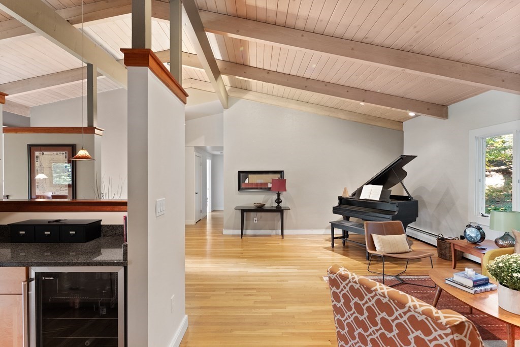 4 Lantern Lane Lexington, MA 02421 - Photo 5 of 29 a living room with furniture and a fireplace