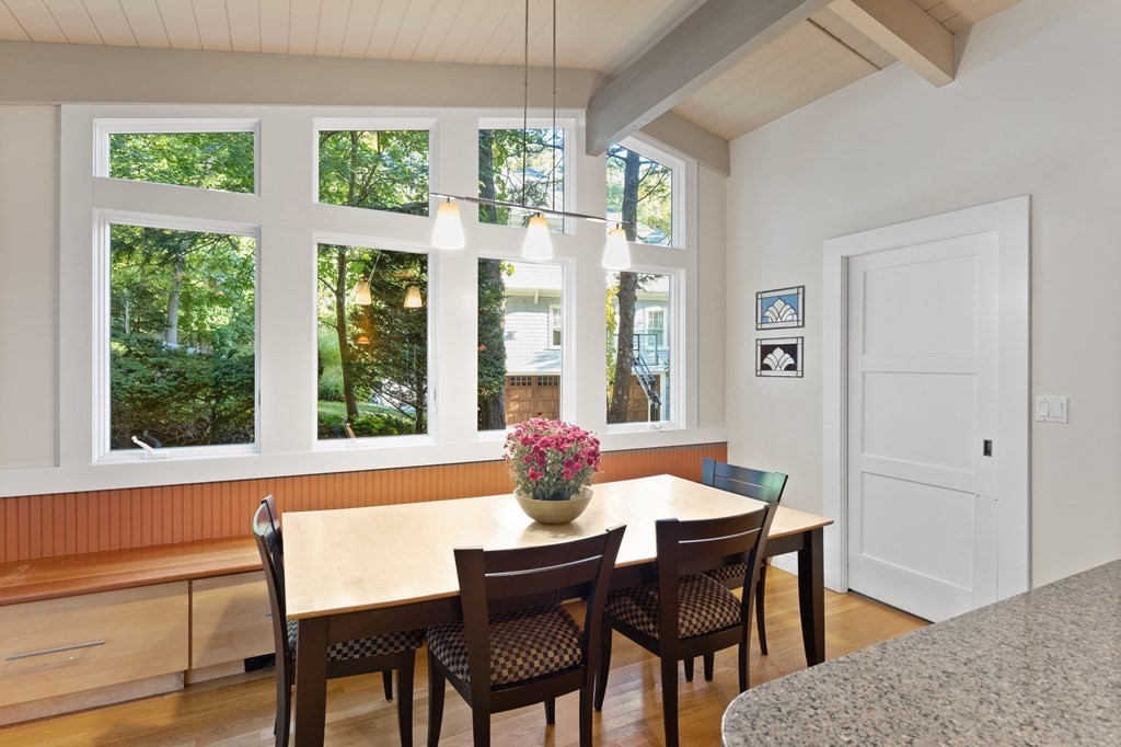 4 Lantern Lane Lexington, MA 02421 - Photo 8 of 29 a dining room with furniture a chandelier and wooden floor