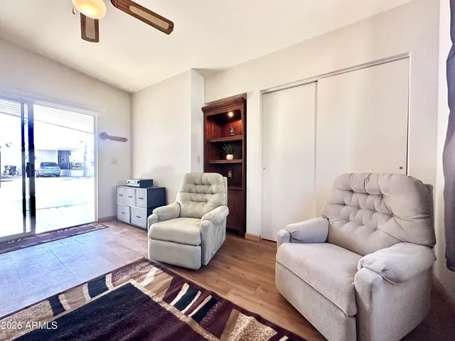 a living room with furniture and a window