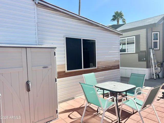 a kitchen with a stove and a refrigerator