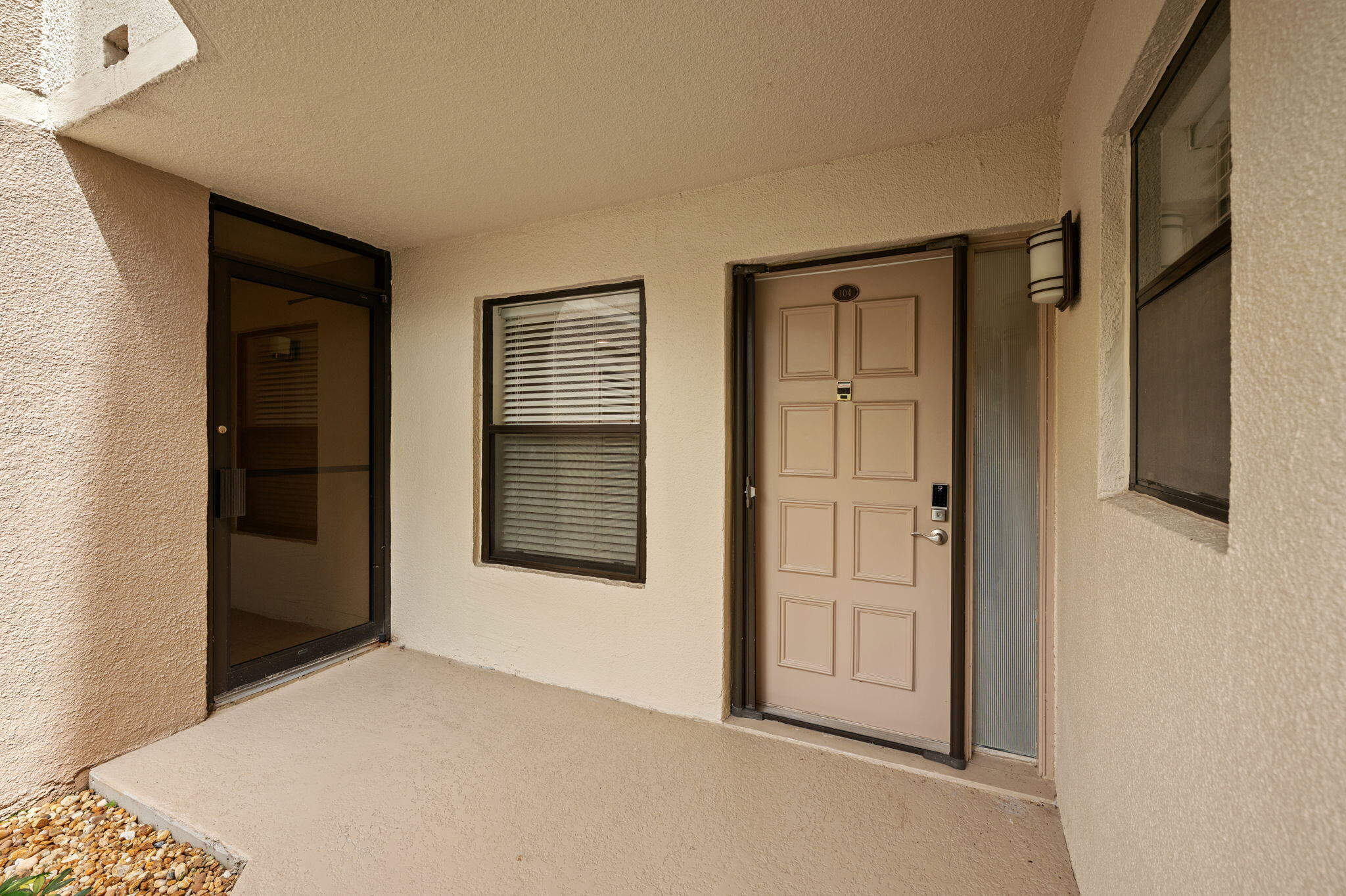 5701 Camino Del Sol, Unit 104 Boca Raton, FL 33433 - Photo 2 of 34 entrance