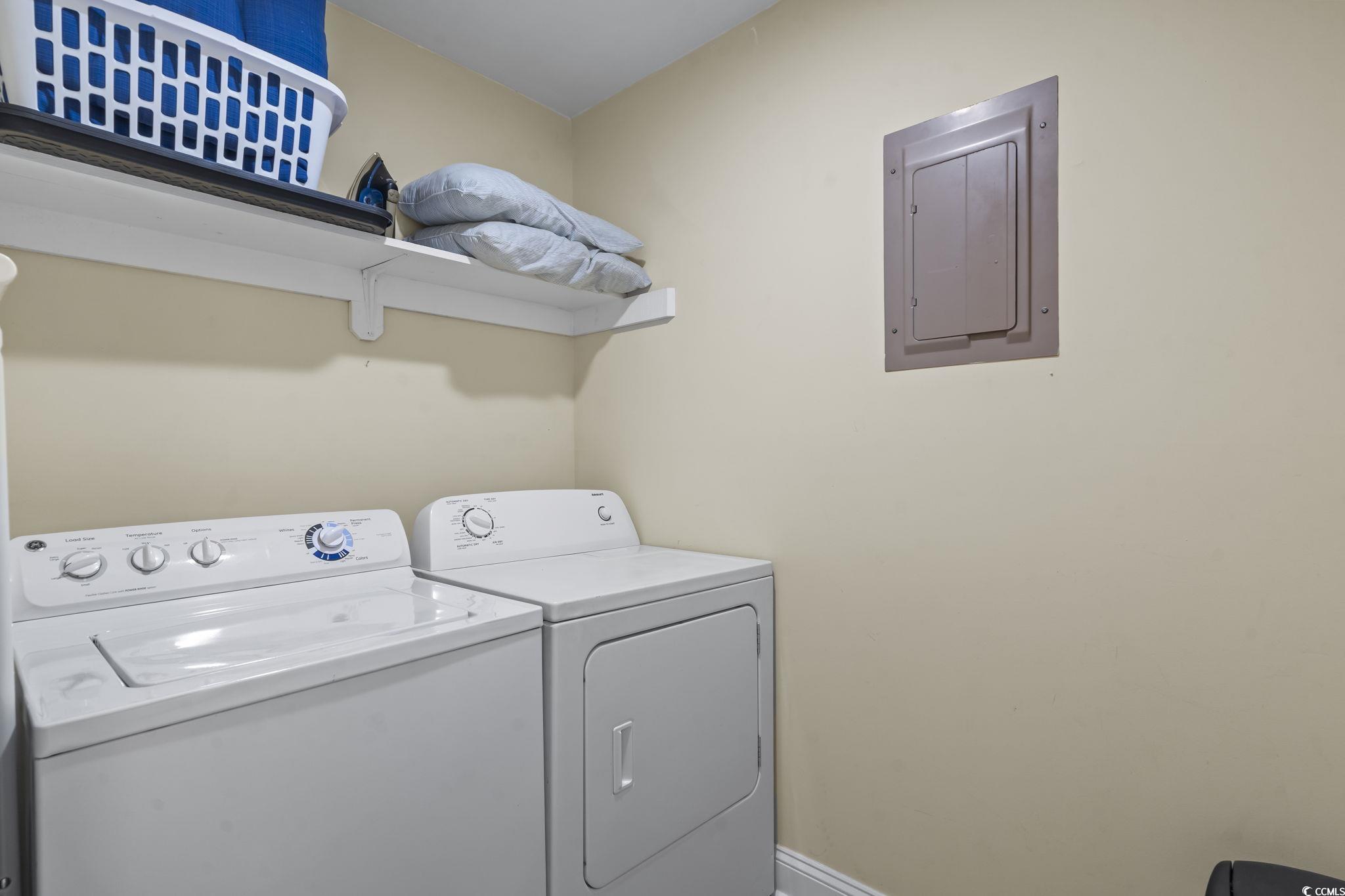 310 3rd Avenue North, Unit A2 Surfside Beach, SC 29575 - Photo 20 of 40 Laundry area featuring electric panel and washer and clothes dryer