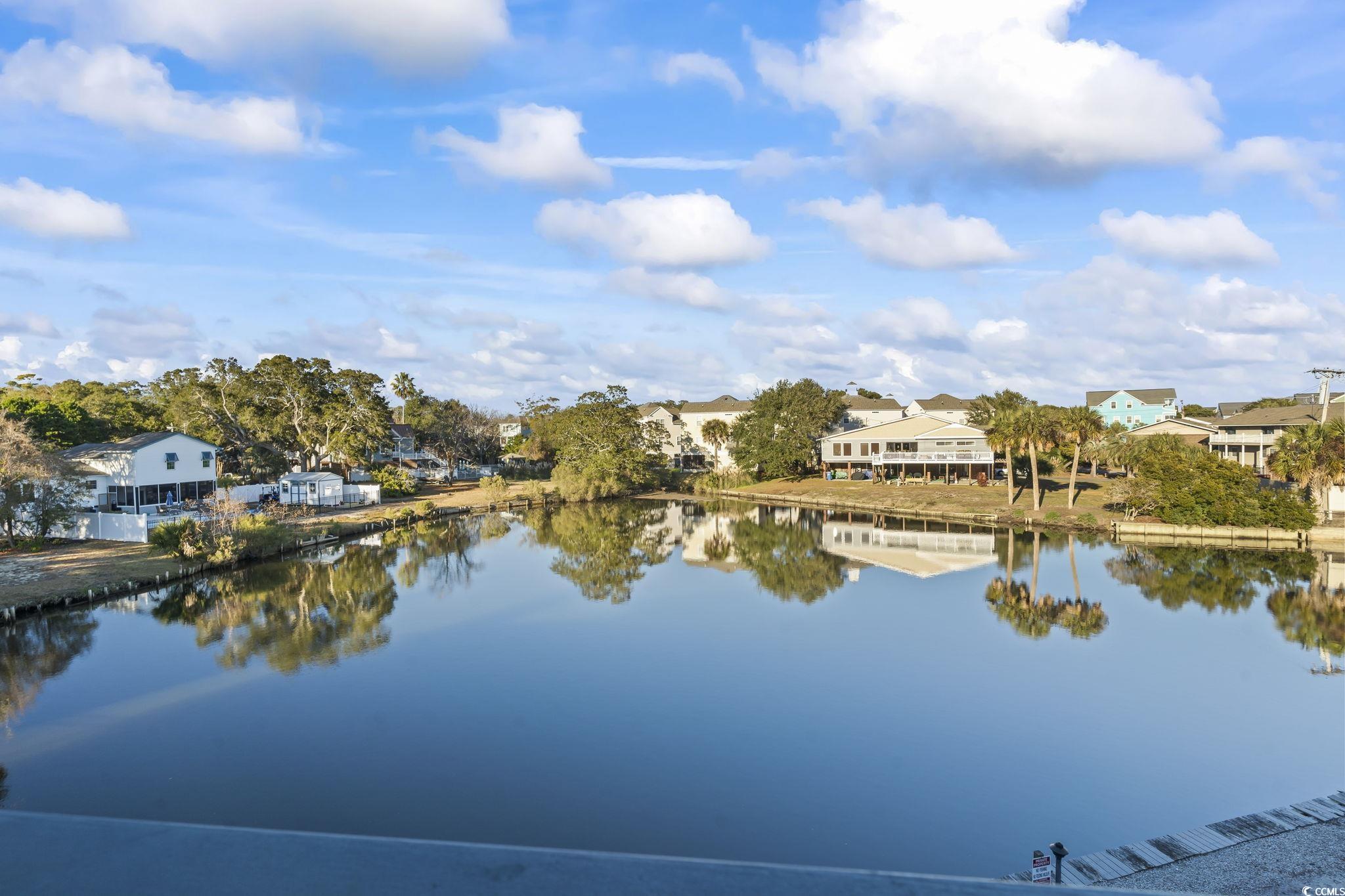 310 3rd Avenue North, Unit A2 Surfside Beach, SC 29575 - Photo 33 of 40 Water view featuring nearby suburban area