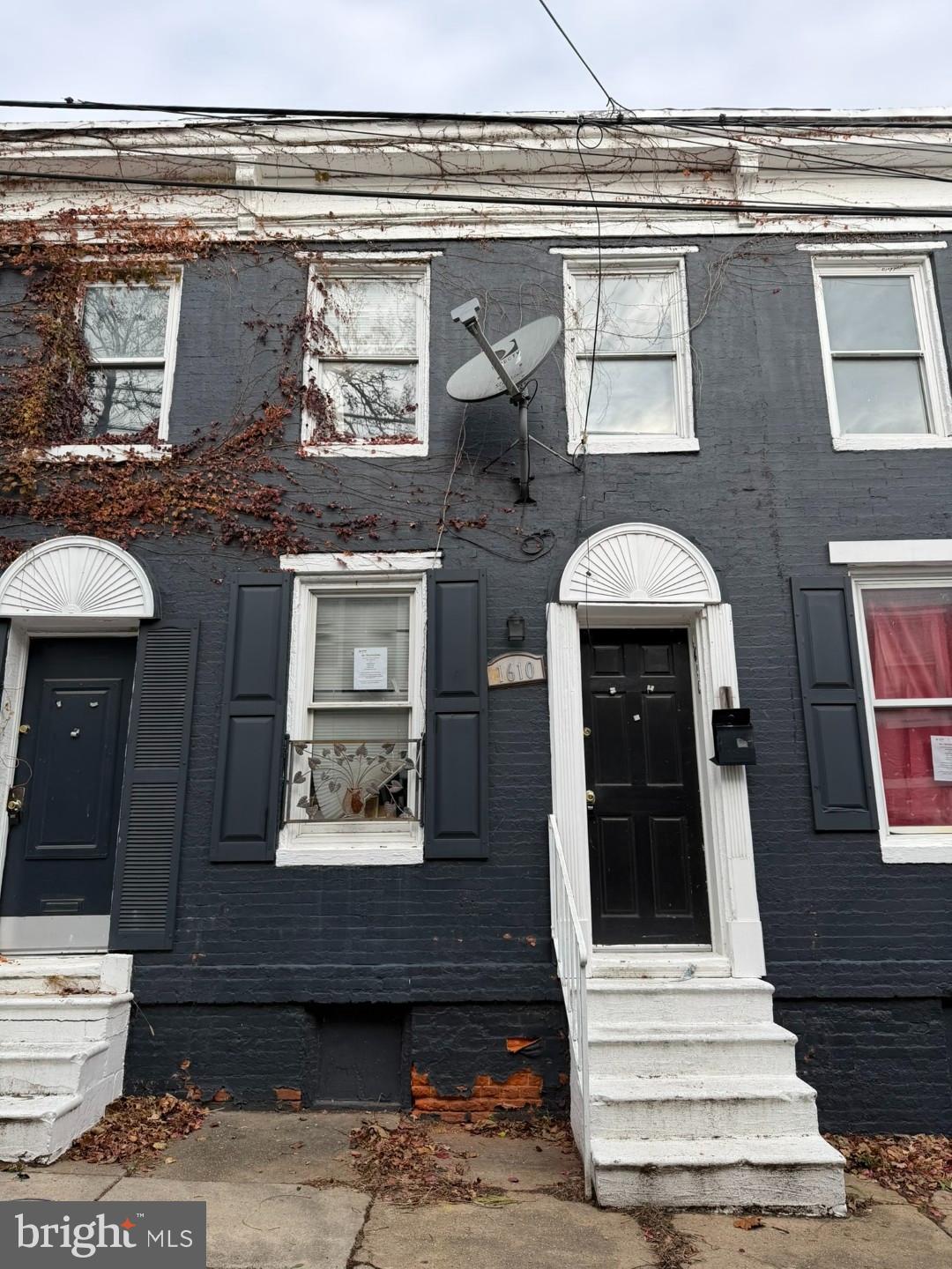 a front view of a house with a entryway