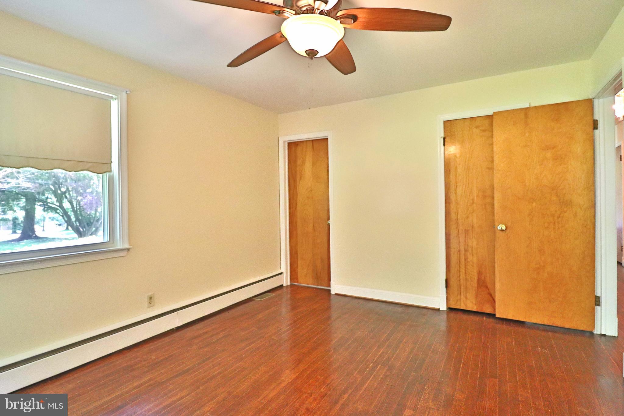 6708 Cherry Hill Road Baldwin, MD 21013 - Photo 21 of 44 a view of empty room with wooden floor