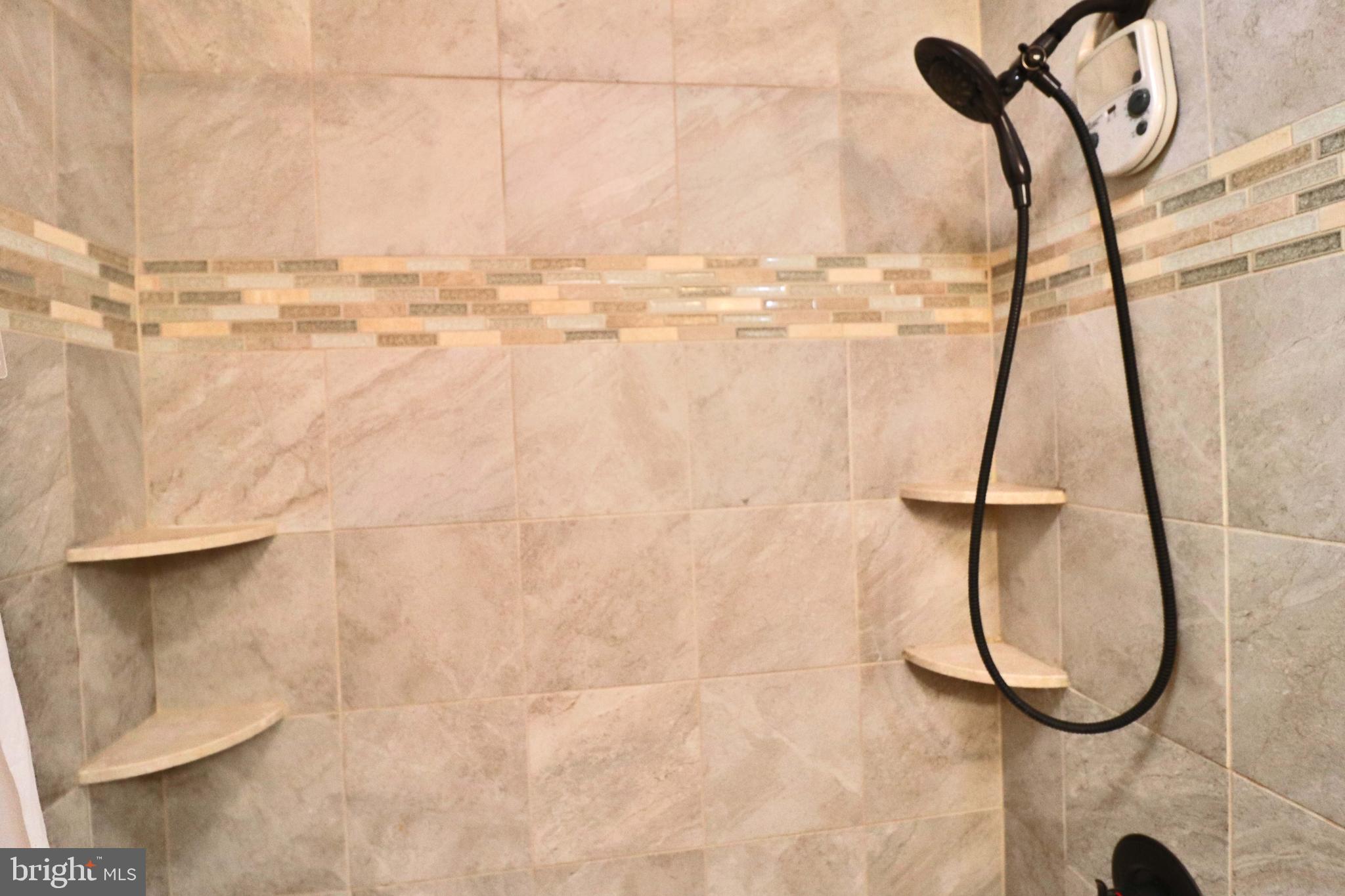 6708 Cherry Hill Road Baldwin, MD 21013 - Photo 23 of 44 a bathroom with a shower