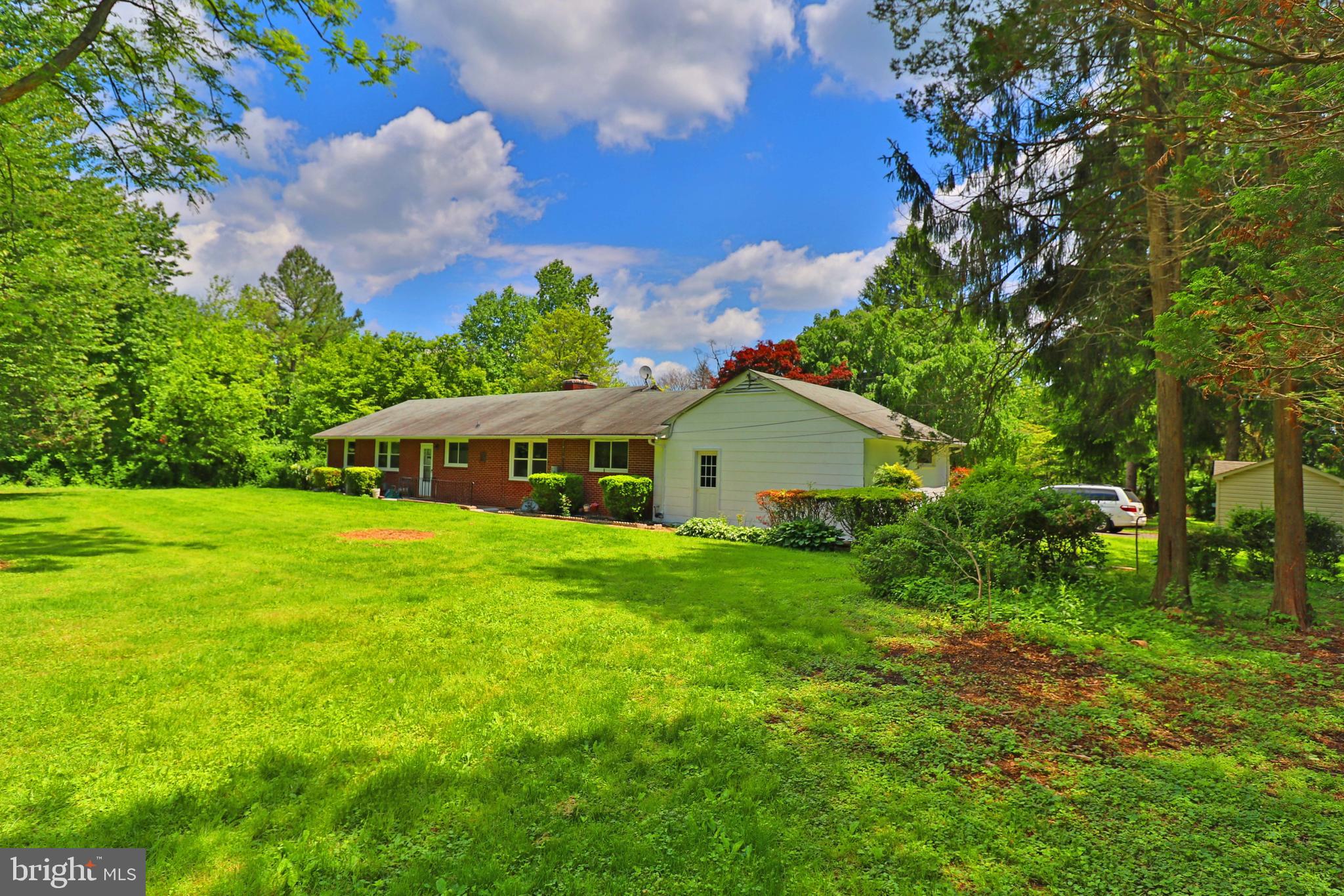 6708 Cherry Hill Road Baldwin, MD 21013 - Photo 43 of 44 a front view of a house with garden