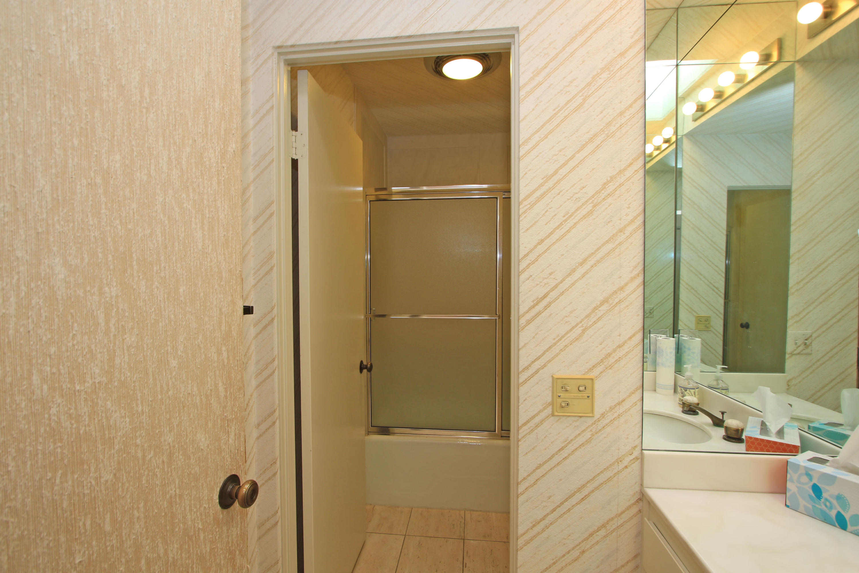 924 Inverness Drive Rancho Mirage, CA 92270 - Photo 19 of 44 a bathroom with a sink and a mirror