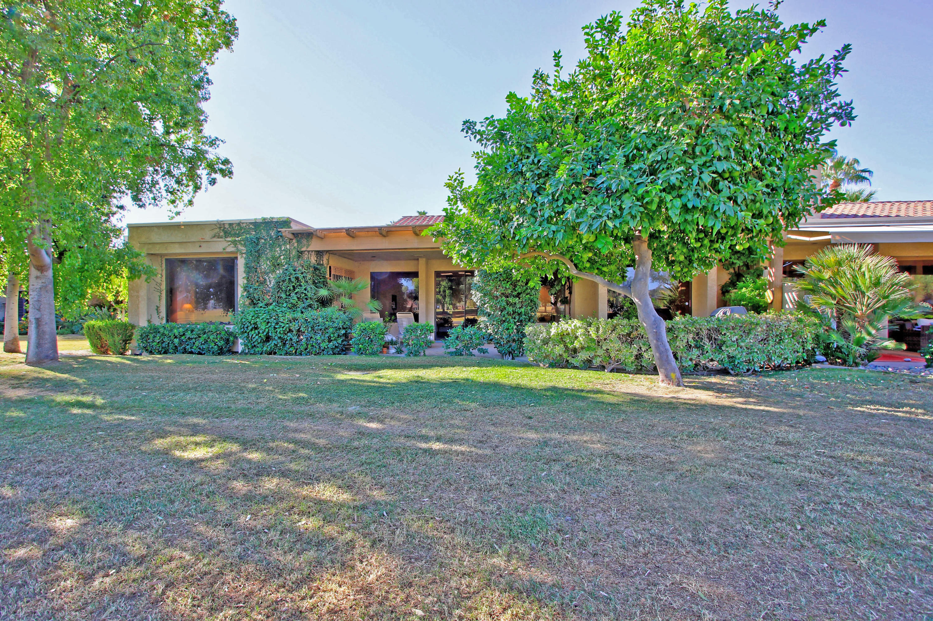 924 Inverness Drive Rancho Mirage, CA 92270 - Photo 38 of 44 a front view of house with yard and green space