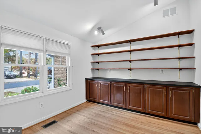 a view of a room with rack on the wall