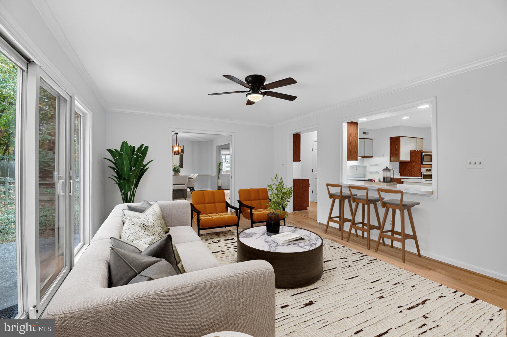 11902 Bernard Drive Silver Spring, MD 20902 - Photo 16 of 47 a living room with furniture and a large window