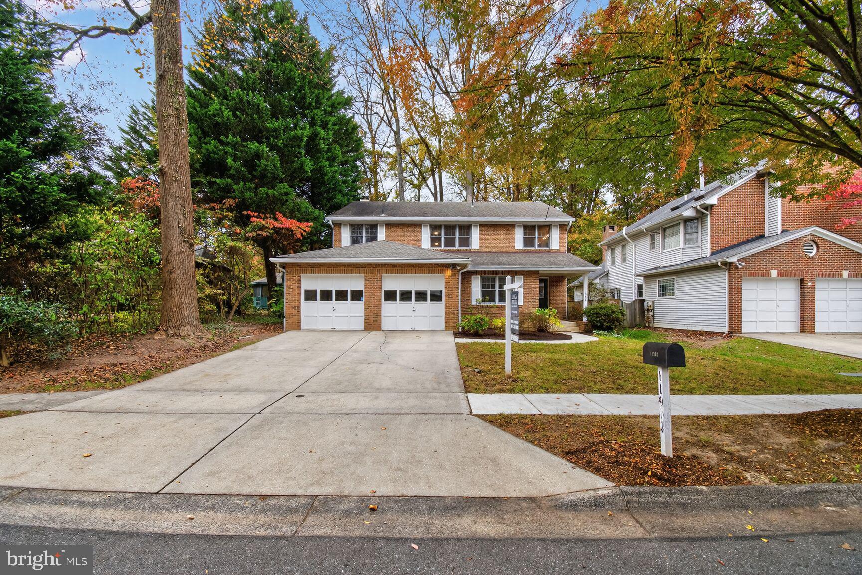 11902 Bernard Drive Silver Spring, MD 20902 - Photo 2 of 47 front view of a house with a yard