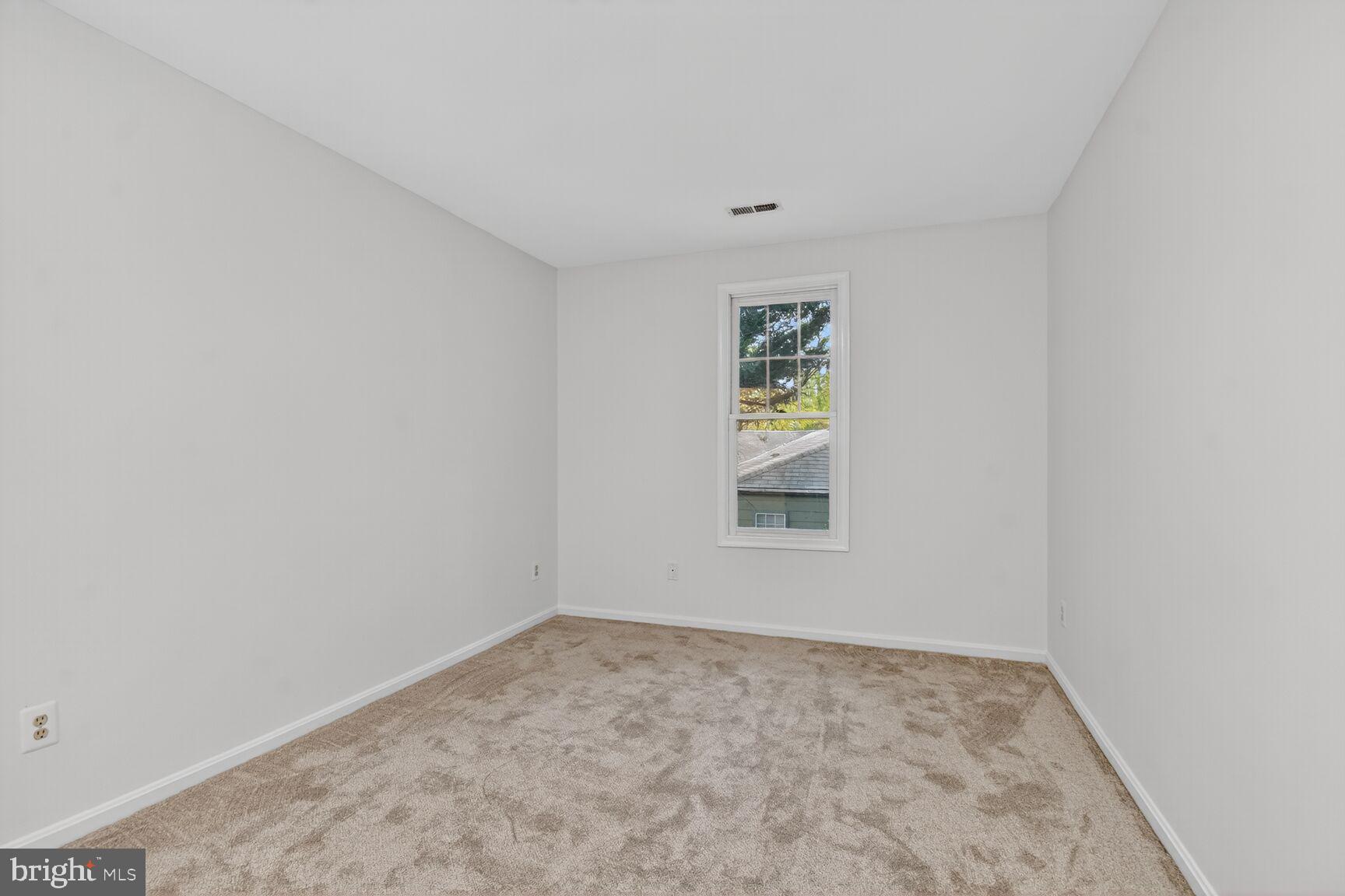 11902 Bernard Drive Silver Spring, MD 20902 - Photo 30 of 47 an empty room with a window