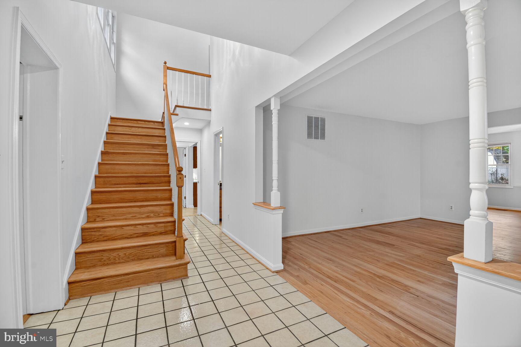 11902 Bernard Drive Silver Spring, MD 20902 - Photo 3 of 47 a view of entryway and hall with wooden floor