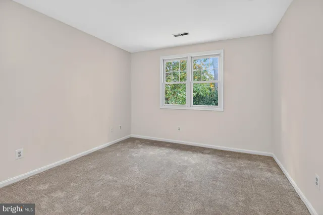 an empty room with a window
