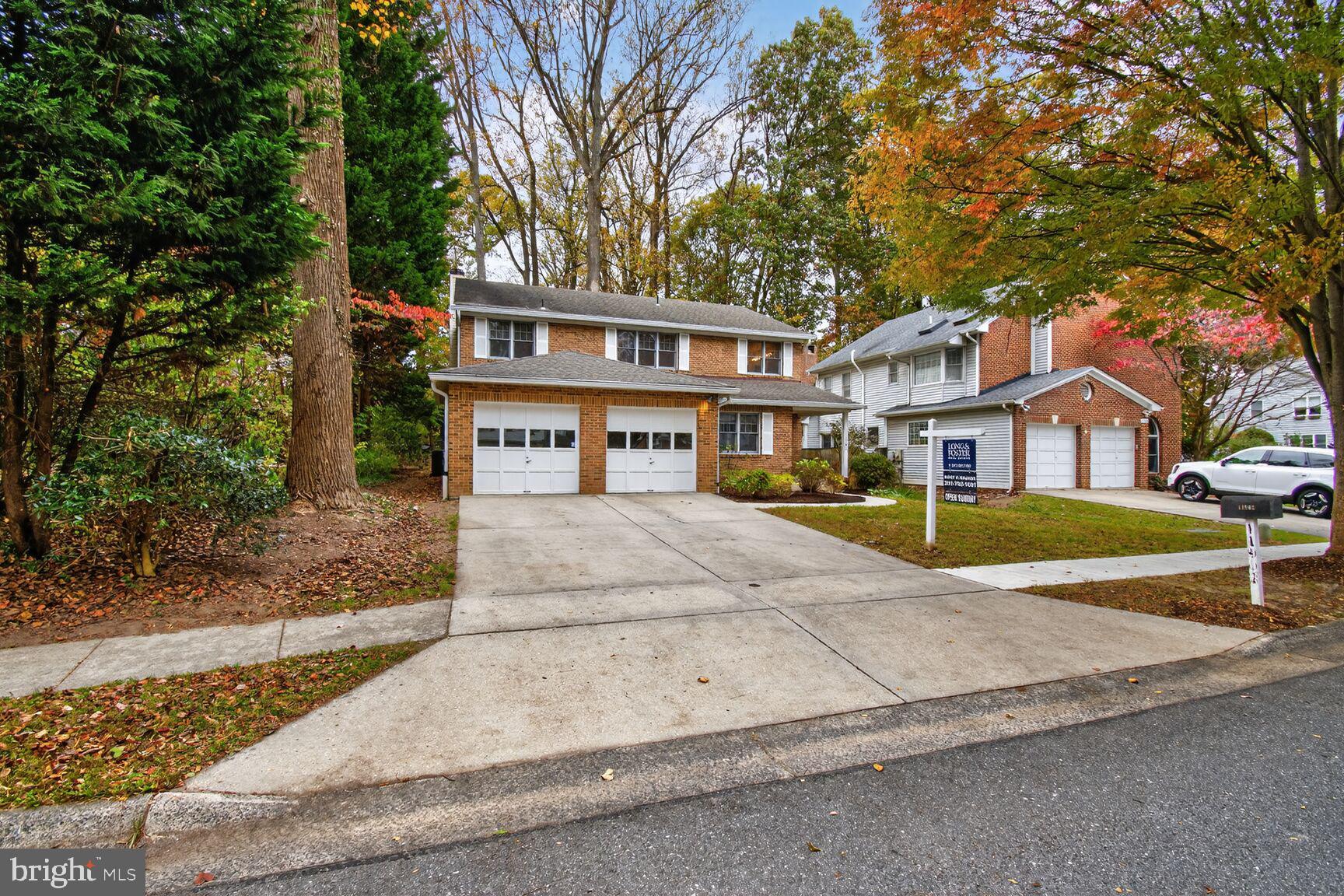 11902 Bernard Drive Silver Spring, MD 20902 - Photo 44 of 47 front view of a house with a yard