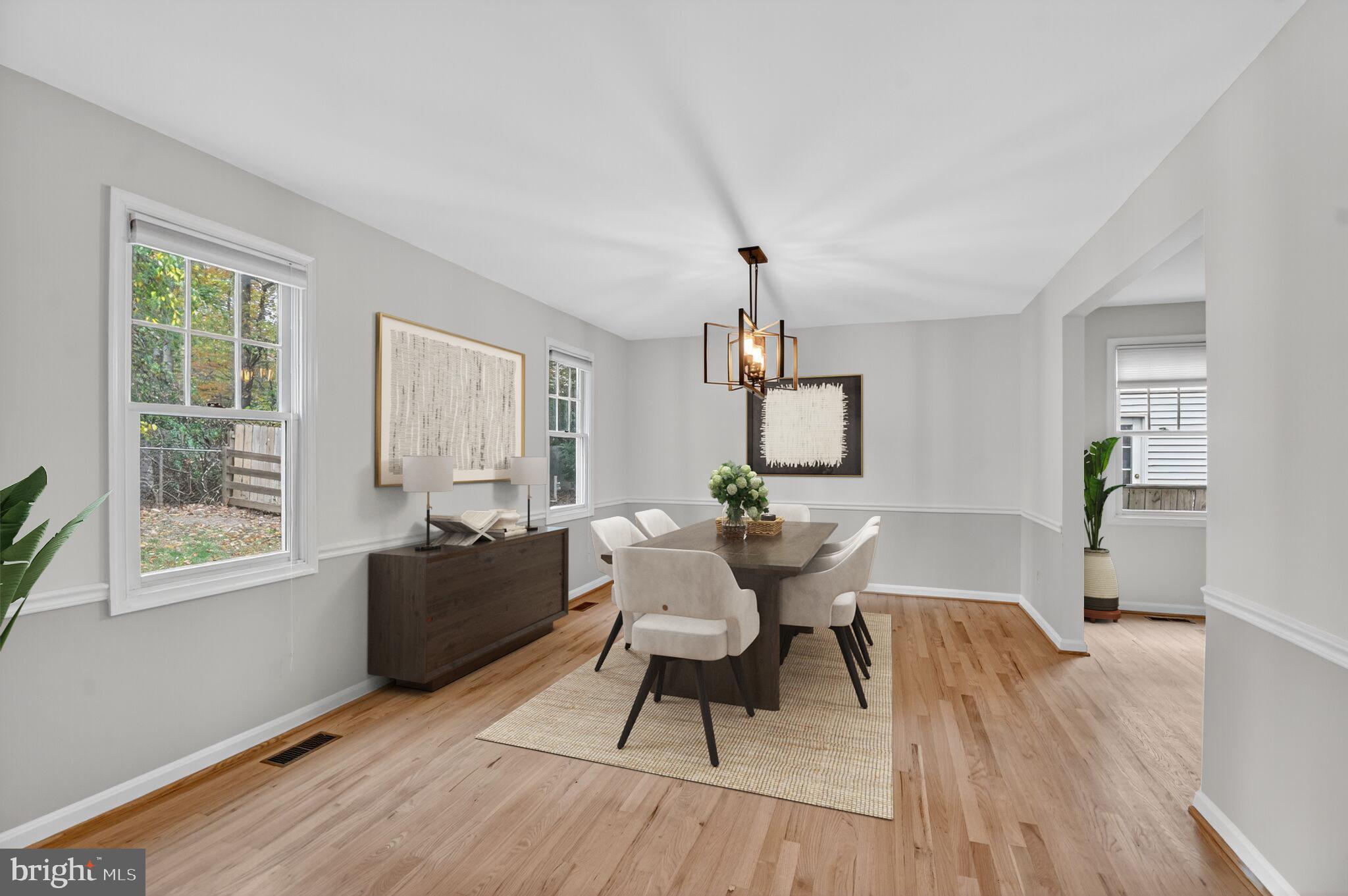 11902 Bernard Drive Silver Spring, MD 20902 - Photo 10 of 47 a living room with furniture and a wooden floor