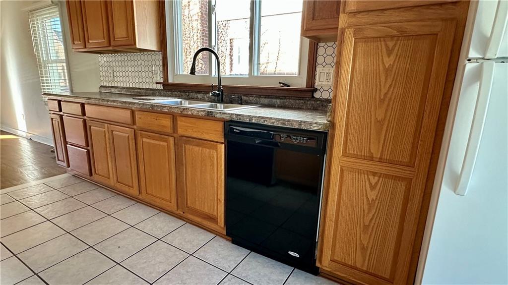 111 South Atlantic Avenue Cheswick, PA 15024 - Photo 16 of 43 a kitchen with stainless steel appliances granite countertop a refrigerator and a sink