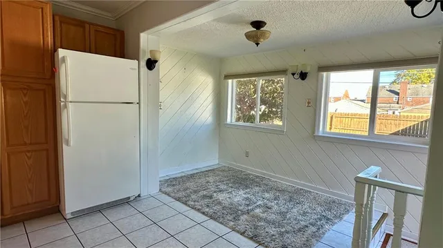 a view of a storage & utility room with a window